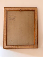 Back of a vintage oil painting on panel showing reverse side of the wood panel