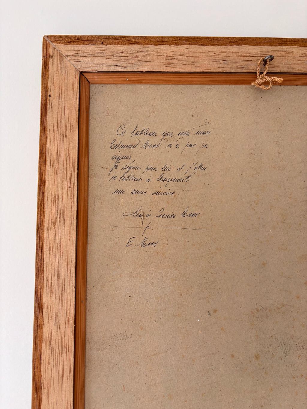 Detail of signature on a vintage oil painting, signed by the artist's wife.