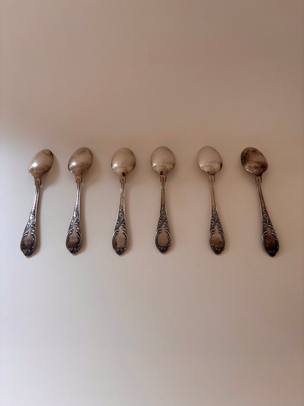 pack of vintage teaspoons back side