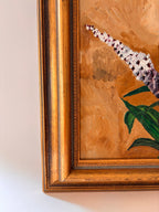 Detail of original gold frame on a vintage botanical oil painting