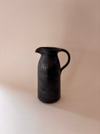 Black glaze vintage stoneware jug with loop handle