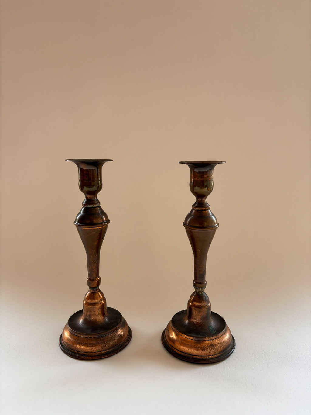 A Vintage Pair of Copper Candlesticks