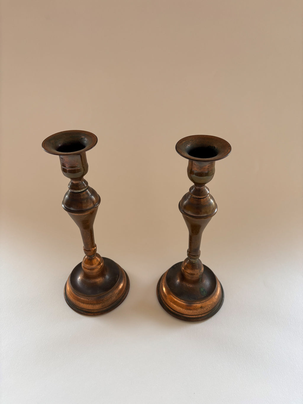 A Vintage Pair of Copper Candlesticks