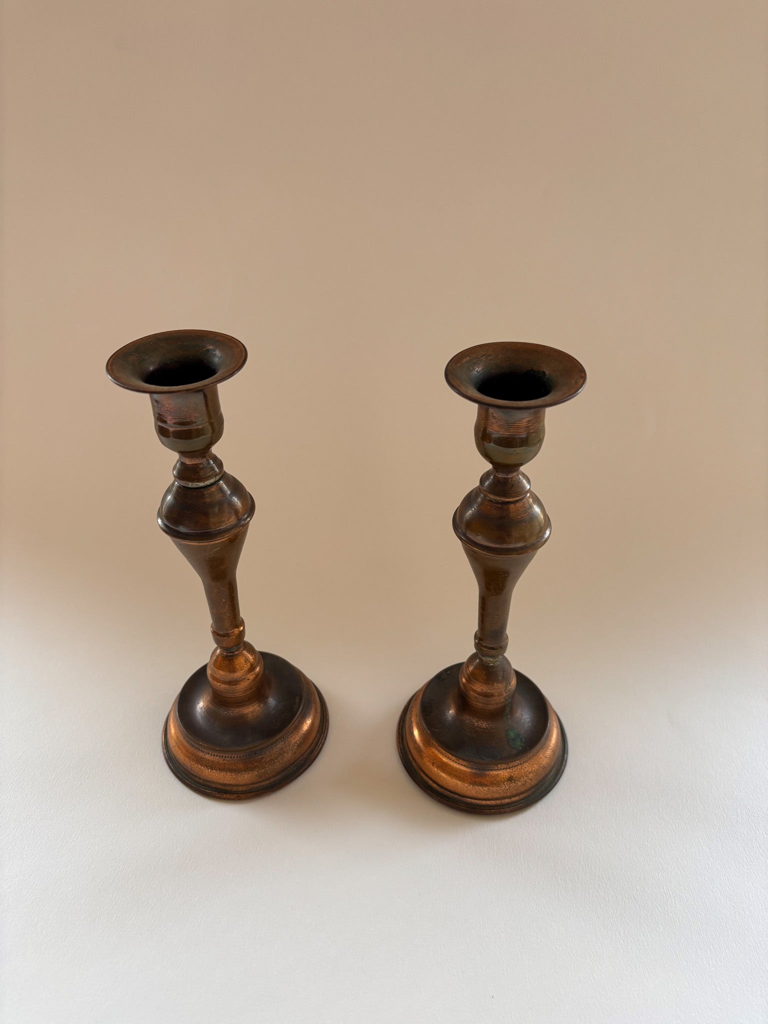 A Vintage Pair of Copper Candlesticks