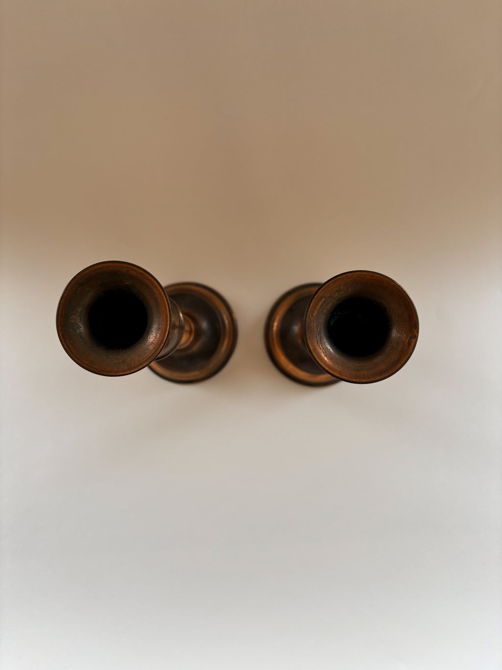 A Vintage Pair of Copper Candlesticks