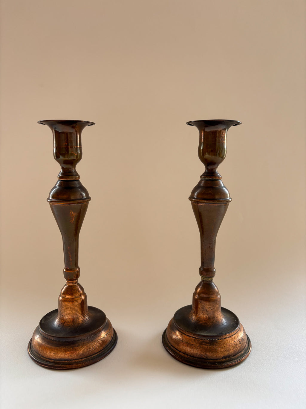 A Vintage Pair of Copper Candlesticks