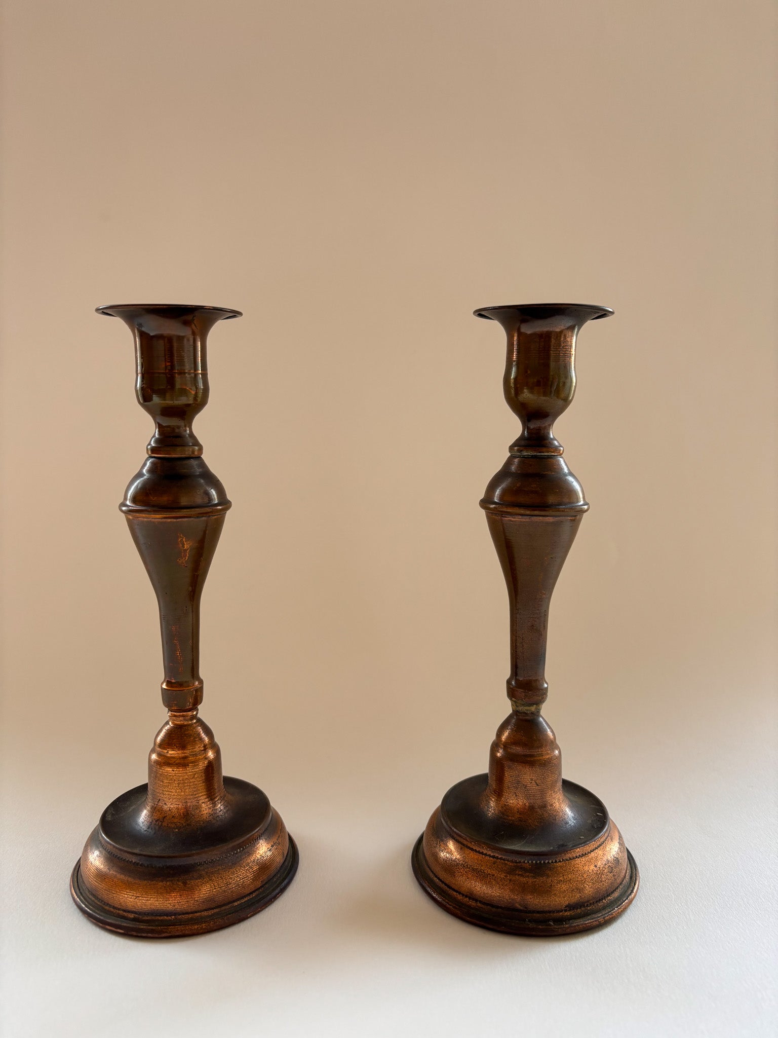A Vintage Pair of Copper Candlesticks