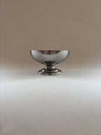 Single vintage stainless steel dessert cup by L'Étang & Rémy showing minimalist curves