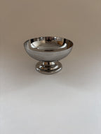 Single vintage stainless steel dessert cup by L'Étang & Rémy showing minimalist curves and brushed finish