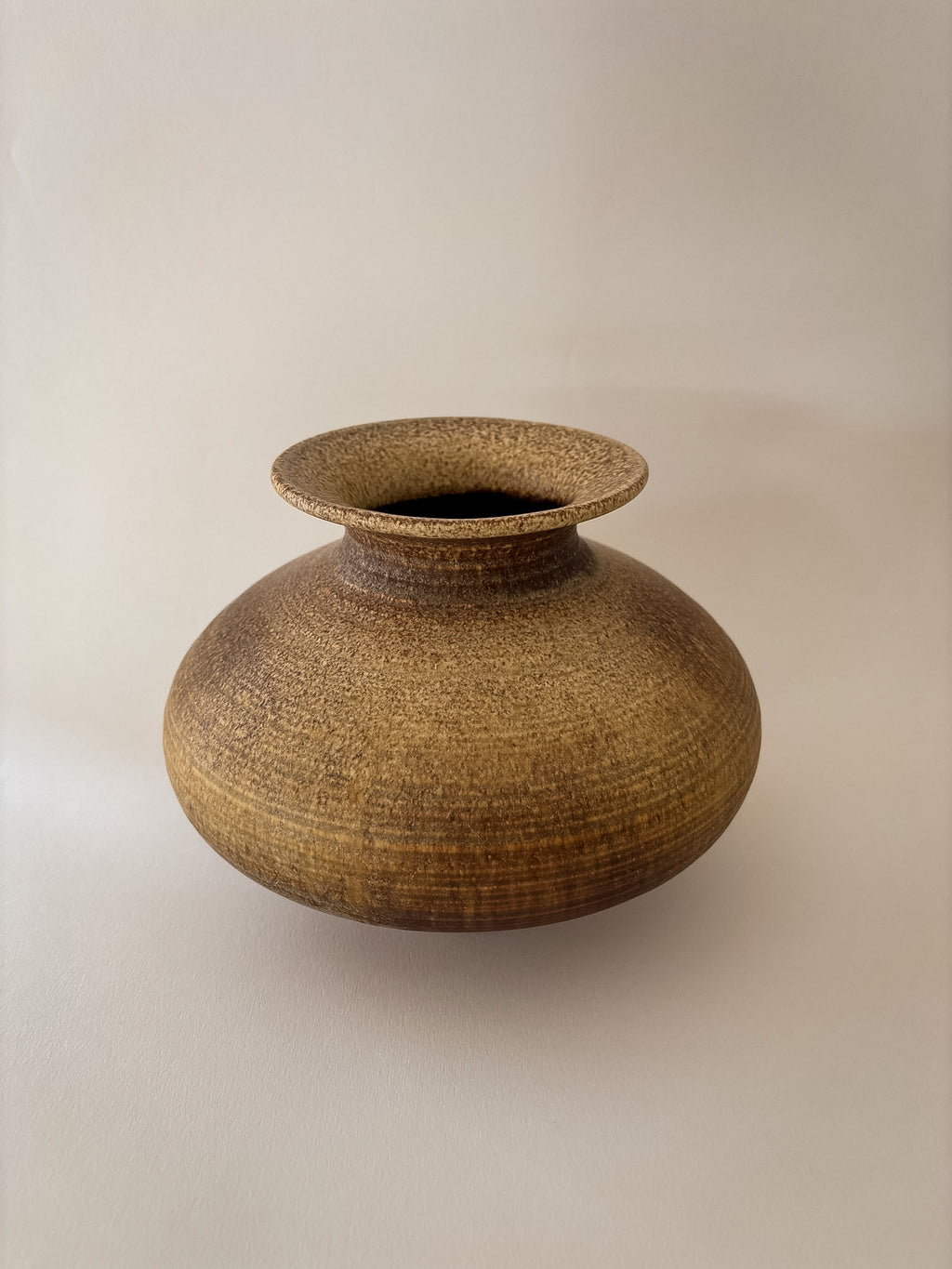 Top view: vintage West German Steuler Keramik art pottery vase in textured brown glaze.