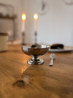 stainless steel dessert cup by L'Étang & Rémy arranged on a neutral surface