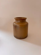 Antique French stoneware mustard jar 1, front view, showing cylindrical form and warm ochre salt-glaze.