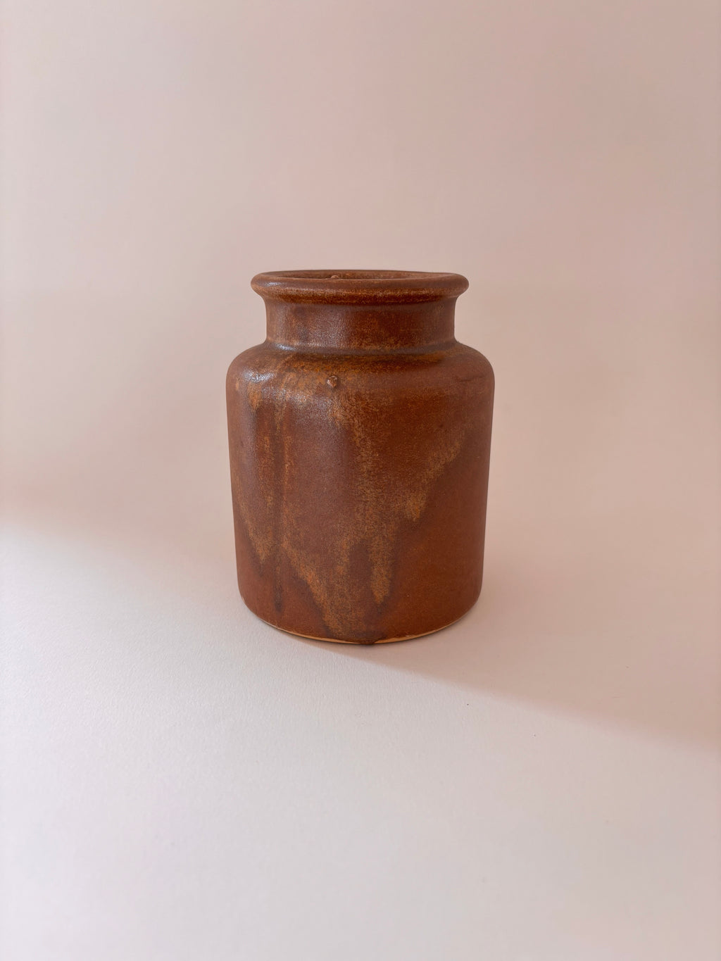 Vintage French stoneware mustard jar 2, front view, showing cylindrical form and warm ochre salt-glaze.