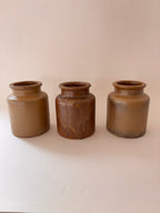 3 vintage French stoneware mustard jars, close-up showing salt-glaze texture, natural colour variations 