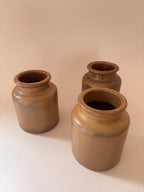Top, face shot (looking down into the opening)
3 vintage French stoneware mustard jars seen from above