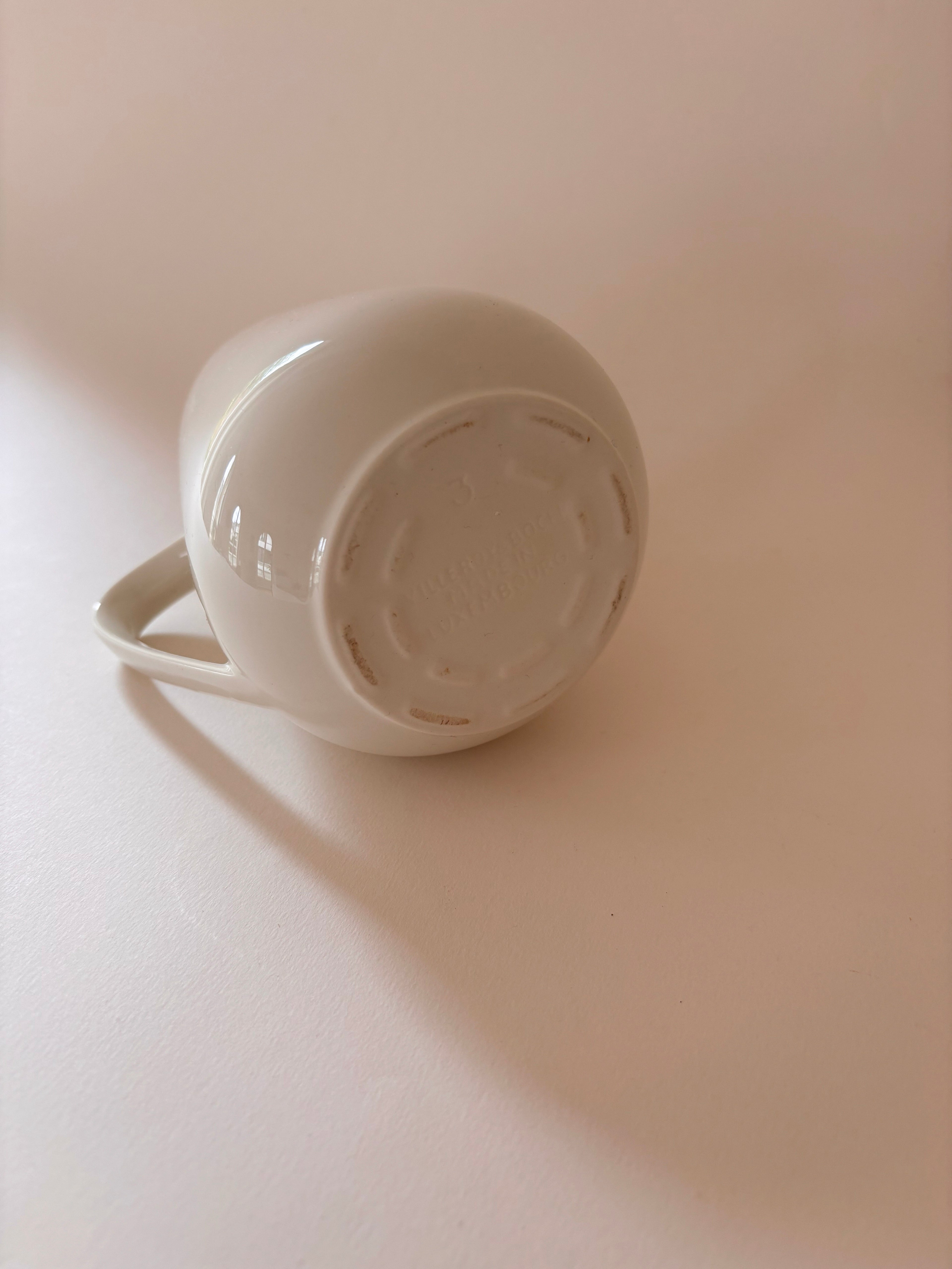 Underside of a vintage Villeroy & Boch white porcelain jug jug showing maker's mark.