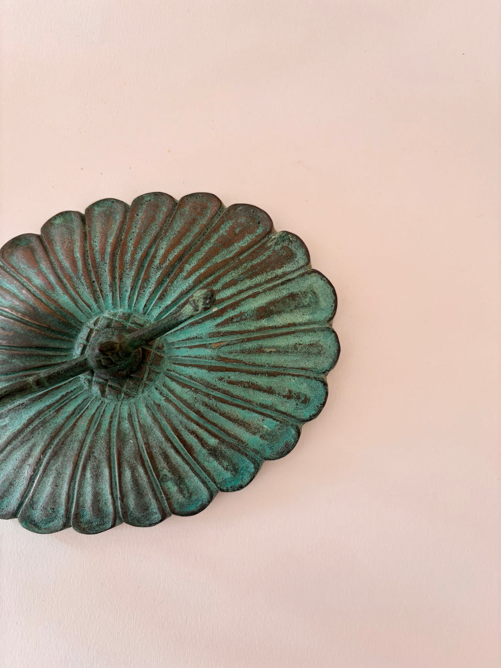 view of a vintage brass  candle scone patina and detail