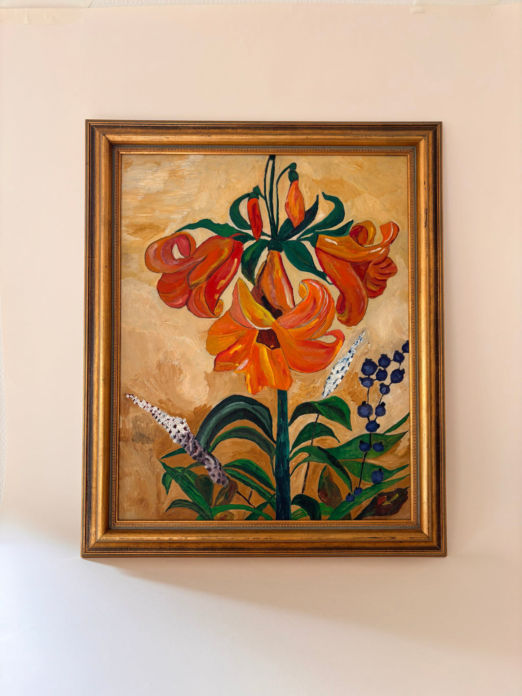 Vintage oil painting on panel of a lily in oranges in an original gold frame