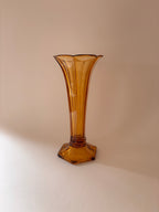 Vintage vase Val Saint Lambert amber pressed glass Art Deco on a neutral surface
