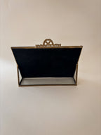 Back view of vintage brass and glass vanity box