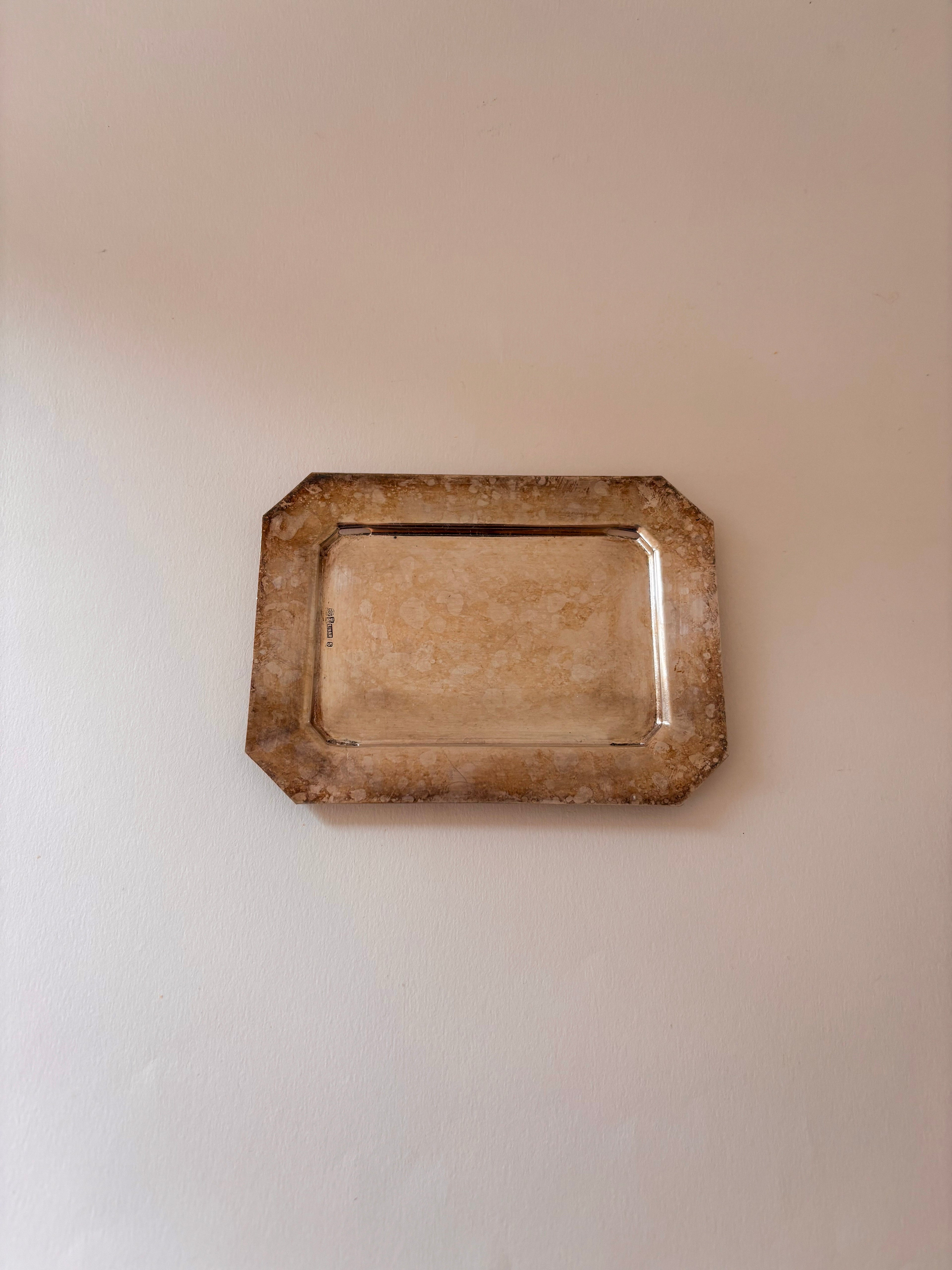 vintage silver-plated toast rack showing the crumb tray