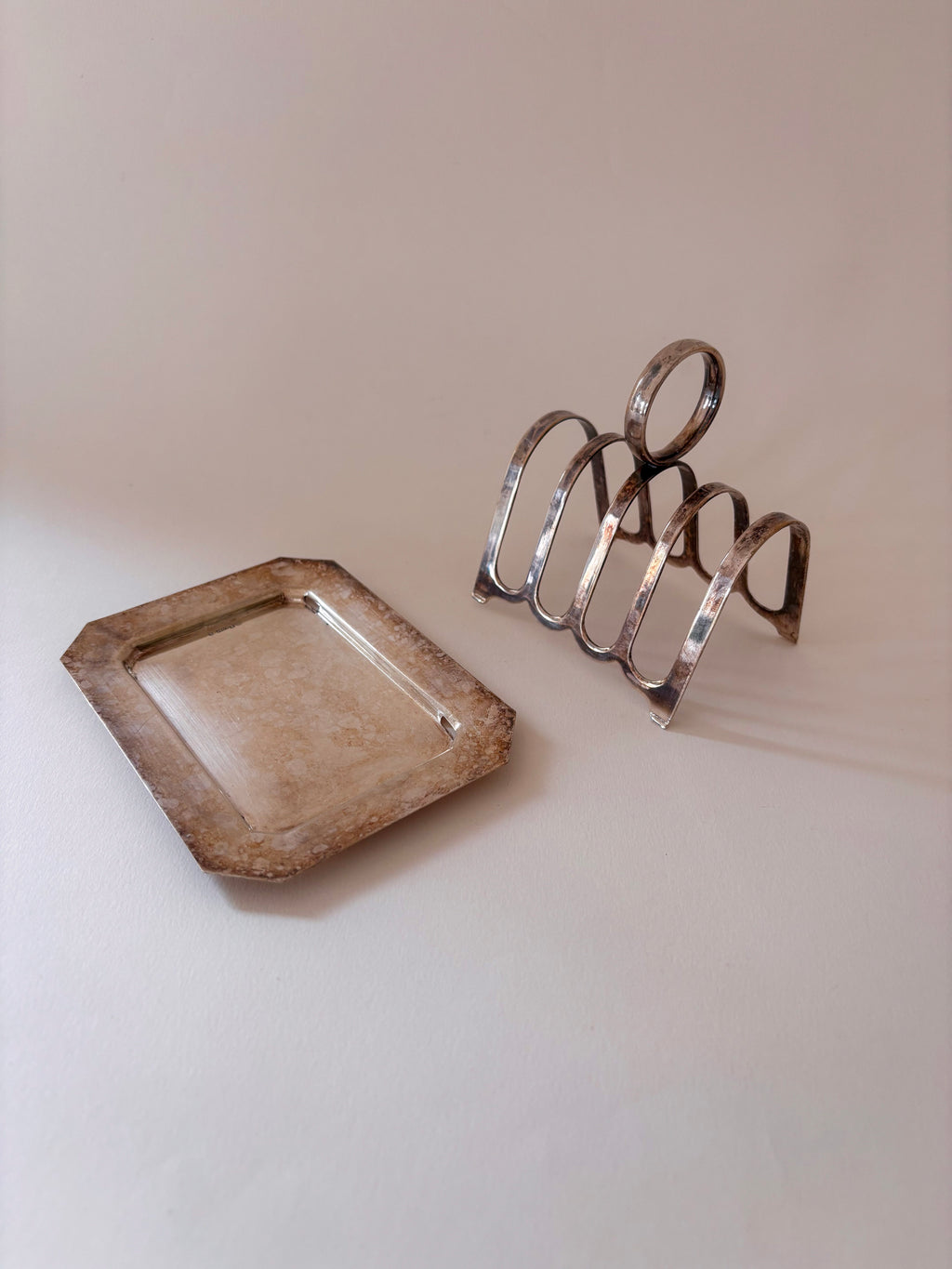 vintage silver-plated toast rack showing slot spacing and rectangular base
